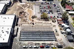 An aerial view of the Frankston tech school with foundations built and poured slabs of concrete.