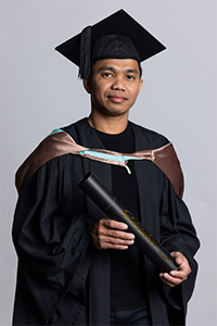 Bachelor Degree graduation gown and hat