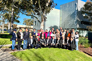 Group photoshoot of HCMC people's committee in front of Chisholm Dandenong campus.